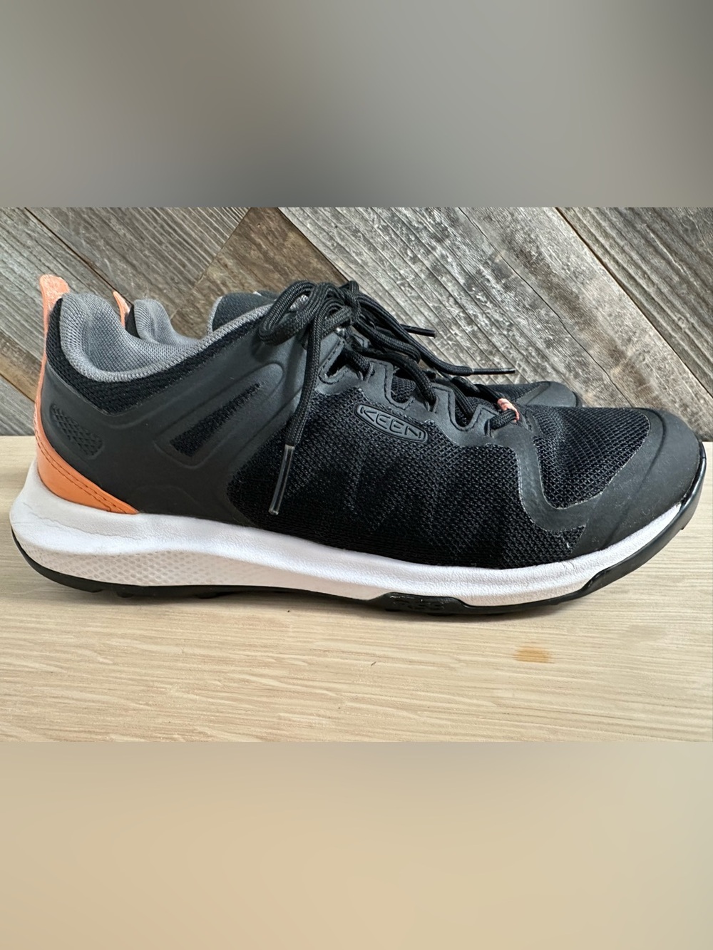 Keen Women's Explore Vent Hiking Shoe in the Trail Black/Orange colorway